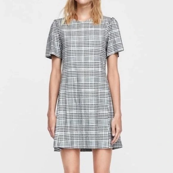 Zara Dresses & Skirts - Zara Black and White Mini Puff Sleeve Dress